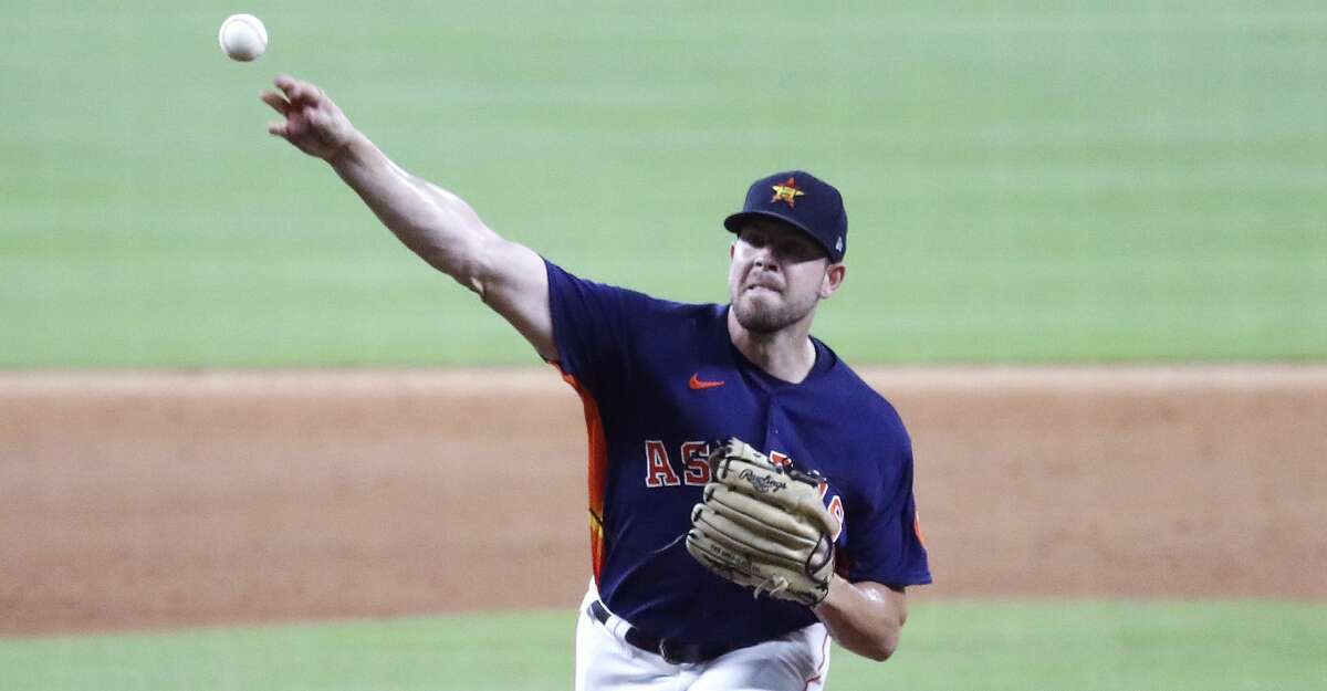 Houston Astros pitcher Brett Conine pitches during an intrasquad game during the Astros summer camp at Minute Maid Park, Wednesday, July 22, 2020, in Houston.