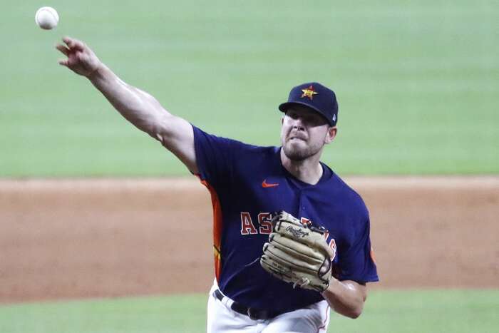 Astros' Baker gets COVID-19 vaccine after initial reticence