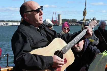 Laurence Capezzone performs during the North Branford Congregational Church's worship service aboard the Amistad in New Haven on October 21, 2018. Following the rebellion of enslaved Africans aboard the Amistad in 1839, Connecticut Congregationalists formed the Amistad Committee which was responsible for organizing a legal defense team for the enslaved Africans and later funding their return to Africa after a favorable Supreme Court ruling.