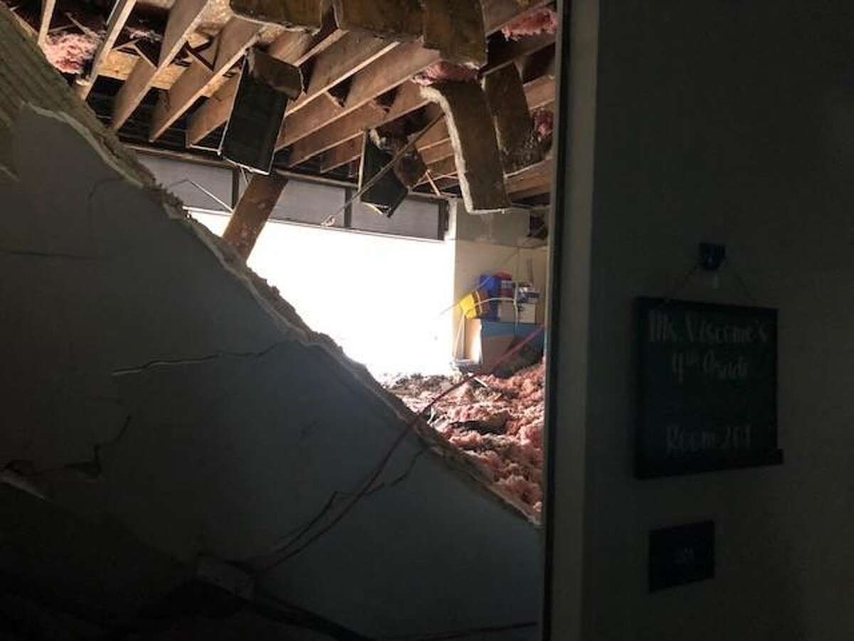 Officials Burst pipe causes ceiling collapse, flood at Greenwich school