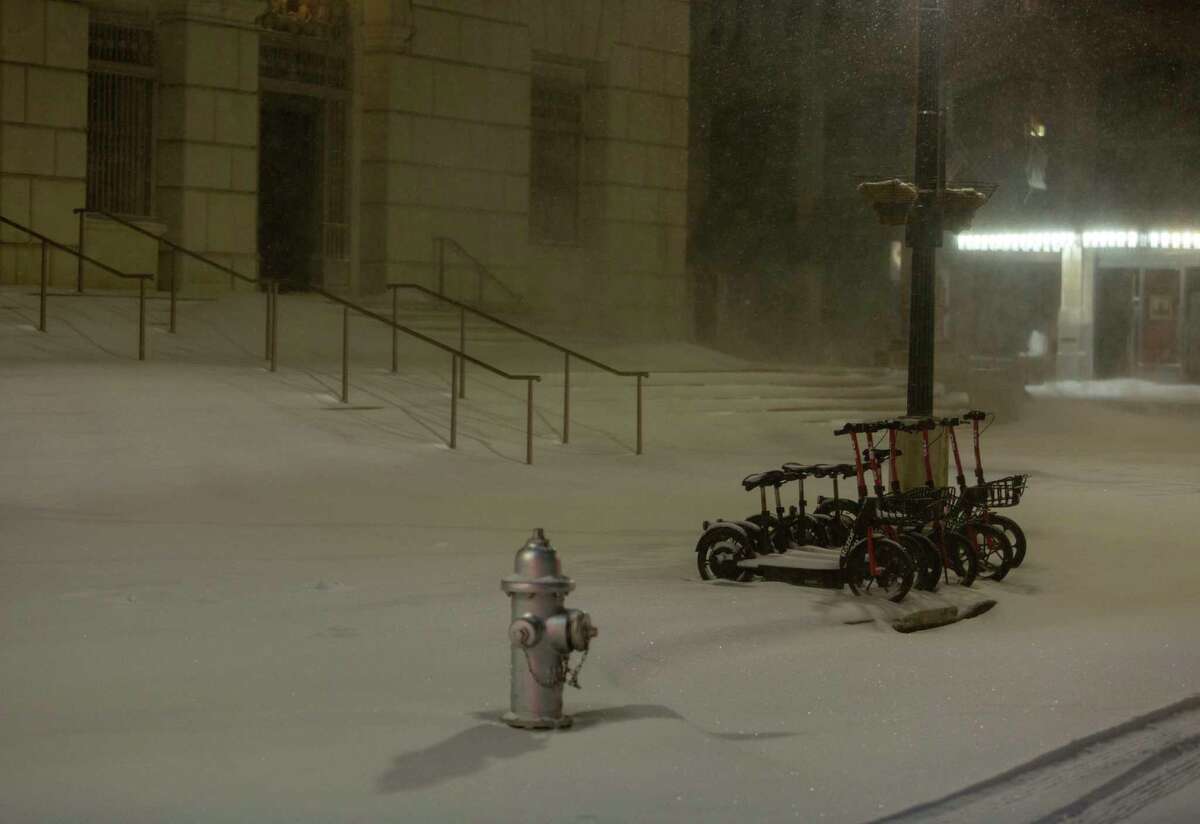 Snow blankets the steps of the Hipolito F. Garcia Federal Building and U.S. Courthouse on Houston Street in downtown San Antonio. The National Weather Service reported Tuesday morning San Antonio and surrounding areas saw 3-5 inches of snow and some pockets of the forecast area saw 6-7 inches of snow. The Electric Reliability Council of Texas (ERCOT) has also declared the highest level of energy emergency and is requiring rolling blackouts throughout Texas. The National Weather Service reports the areas temperatures are the coldest since 1989.