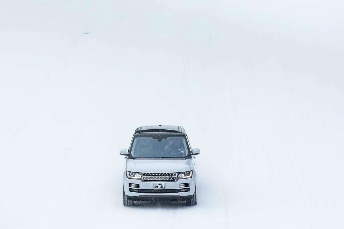 Traffic is sparse on the snow-covered I-45 near The Woodlands Parkway following an overnight snowfall Monday, Feb. 15, 2021 in The Woodlands. Temperatures plunged into the teens Monday with light snow and freezing rain.