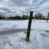 Snow and sleet dust the ground at Ave. A in Beaumont, Texas on the morning of Monday, Feb. 15, 2021. Photo by Kim Brent / Beaumont Enterprise
