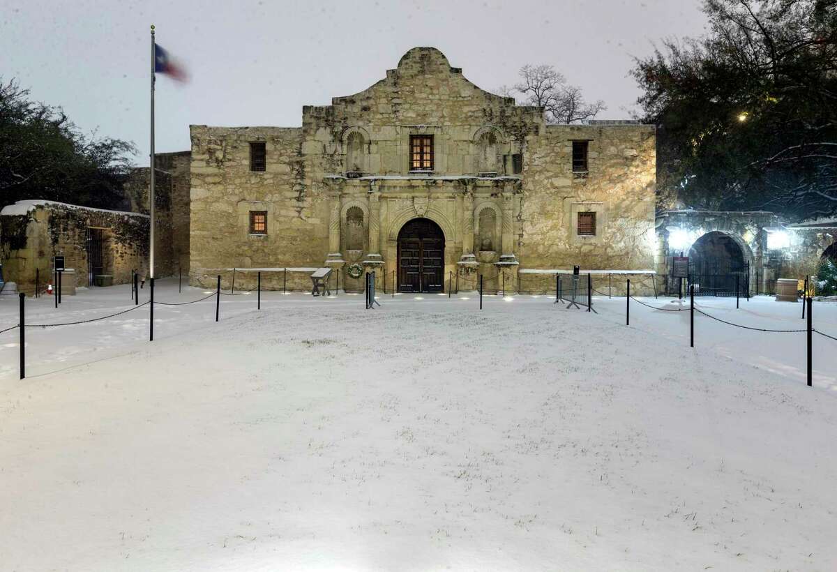 The Alamo is seen early Monday, Feb. 15, 2021, after 3 to 5 inches of snow fell overnight. The Alamo was closed because of the bitter cold and snow.