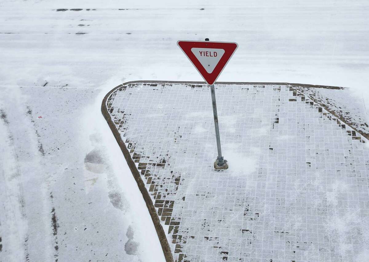 A snow-covered Katy Freeway is photographed Monday, Feb. 15, 2021, in Houston.
