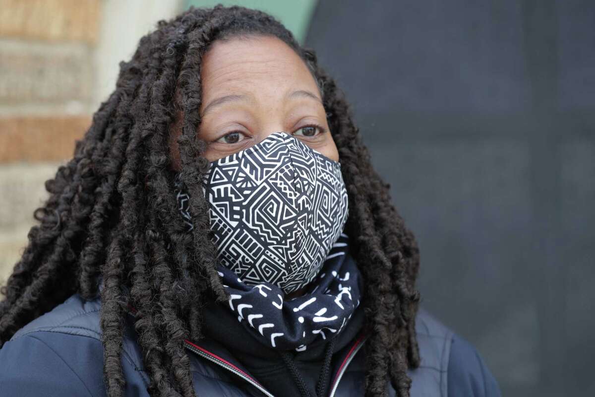 Maya Ford talks about not having power and how it effects her neighbors in Third Ward Monday, Feb. 15, 2021, in Houston.