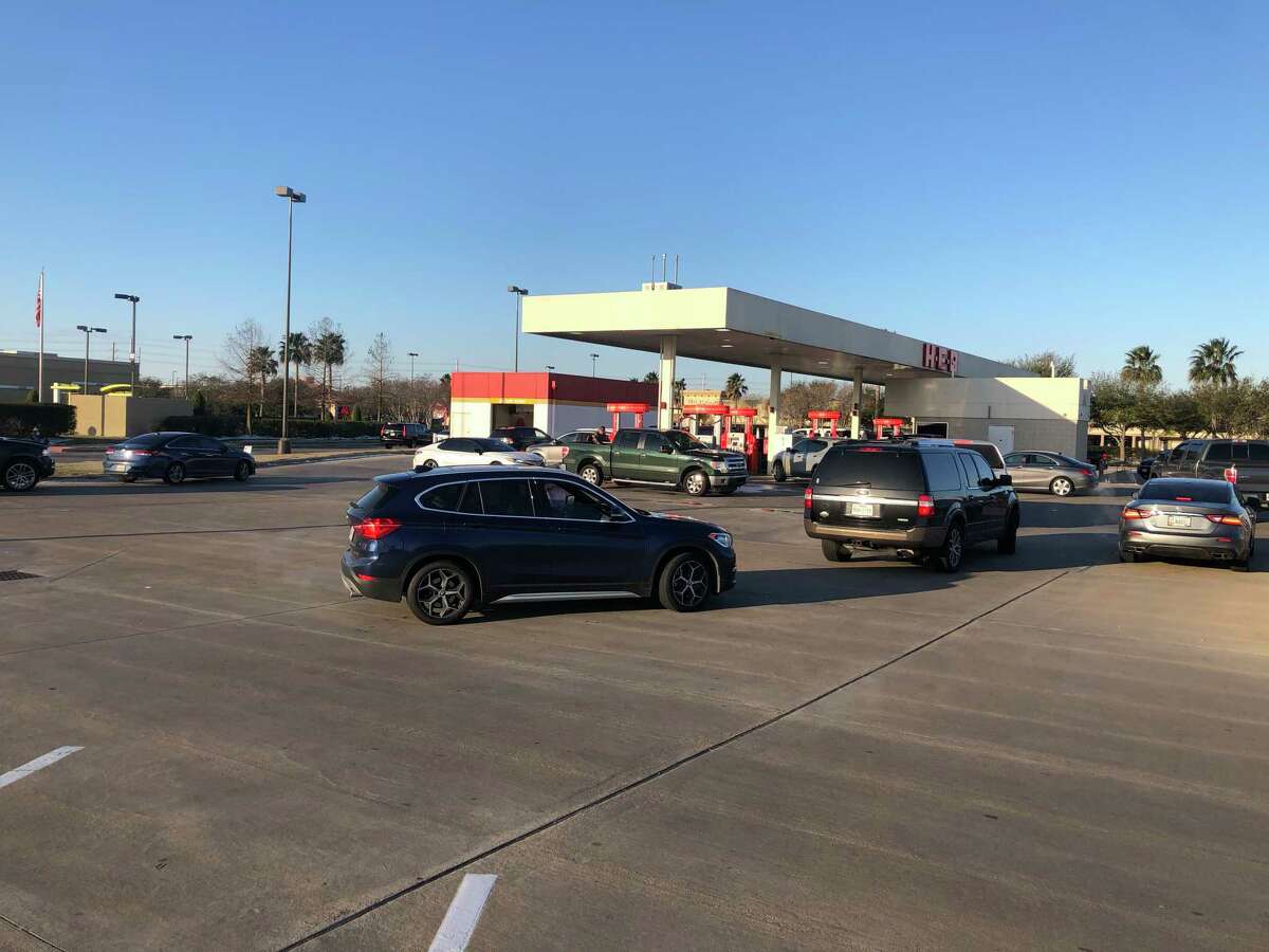 Lines form for people trying to get gas at the H-E-B Plus! February 16, 2021 in Pearland.