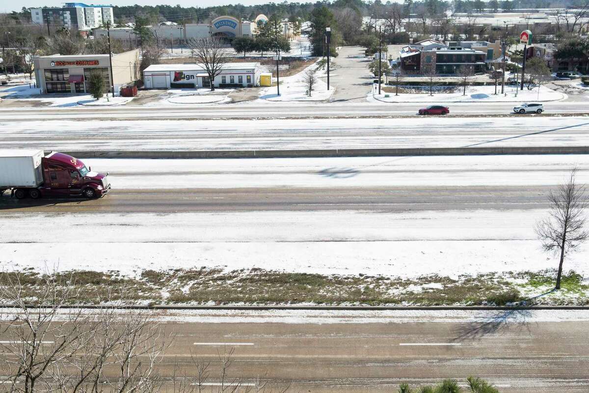 Few vehicles travel along I-45 north of Houston Tuesday, Feb. 16, 2021 in Shenandoah. Traffic continued to be light on the roadways as temperatures stayed below freezing Tuesday and roads remained icy.