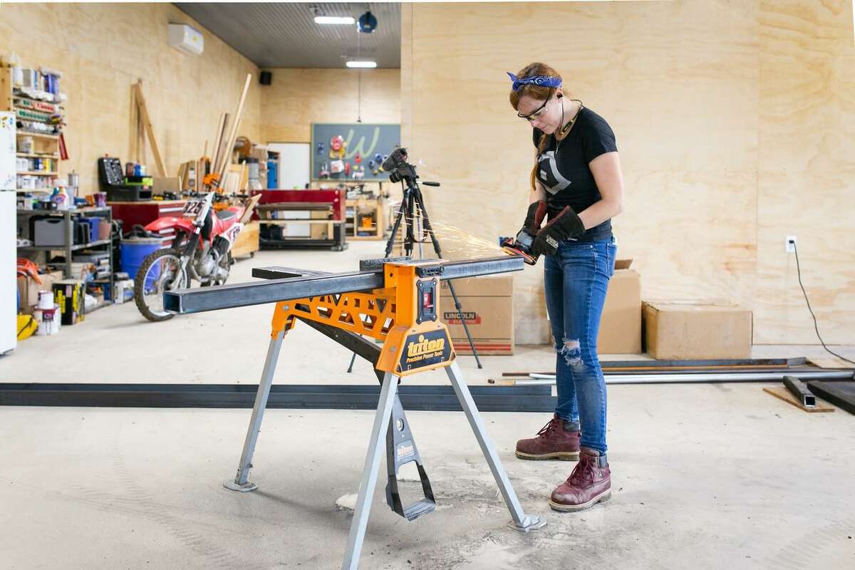 April Wilkerson, who has made a name for herself as a DIY building expert, works on projects in a shop she built herself.