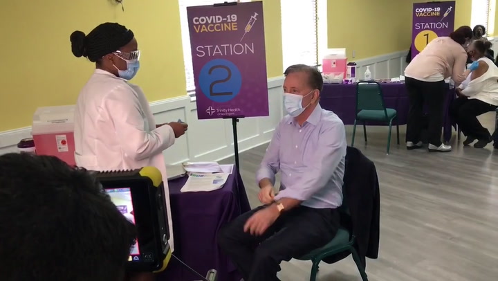 Lamont gets his vaccine, with a message to the Black community - Vimarsana News