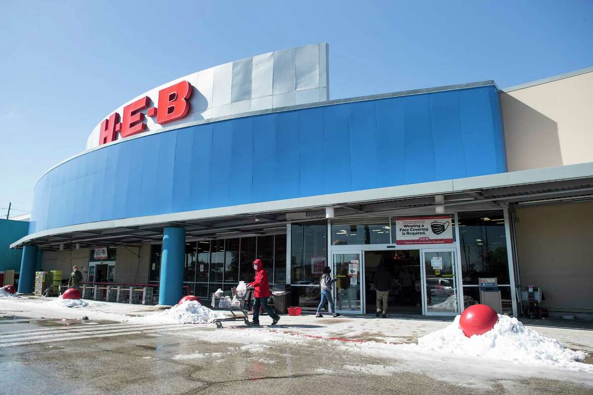 HEB customers leave a store in Spring as they load up on supplies Tuesday, Feb. 16, 2021 in Spring following a frigid winter storm. Temperatures stayed below freezing Tuesday and roads remained icy forcing detours on a number of roads throughout the city. More cold temperatures and possible freezing rain are forecast the next few days.