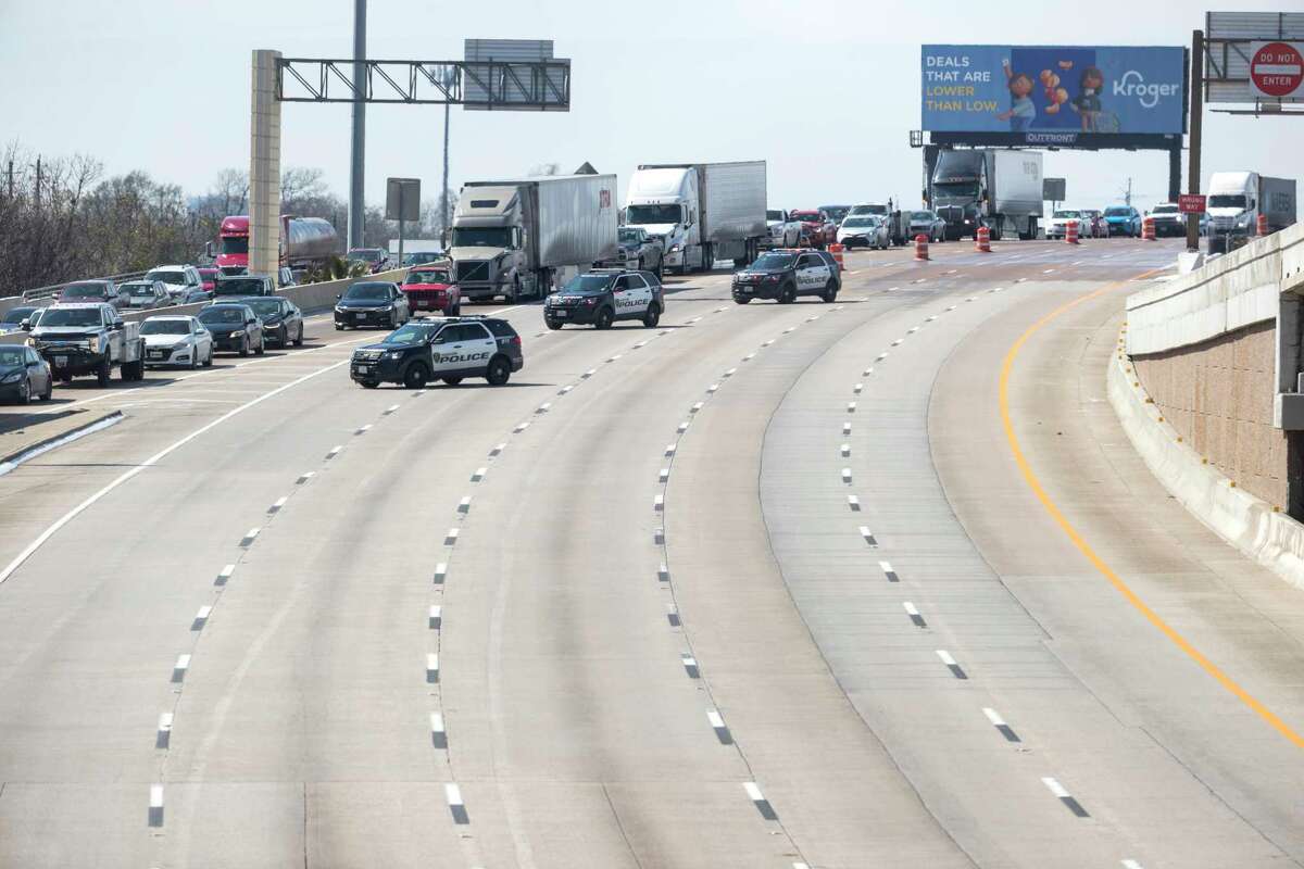Eastbound raffic is diverted off I-10 near Taylor after the freeway was closed due to icy conditions Tuesday, Feb. 16, 2021 in Houston. Temperatures stayed below freezing Tuesday and roads remained icy forcing detours on a number of roads throughout the city.