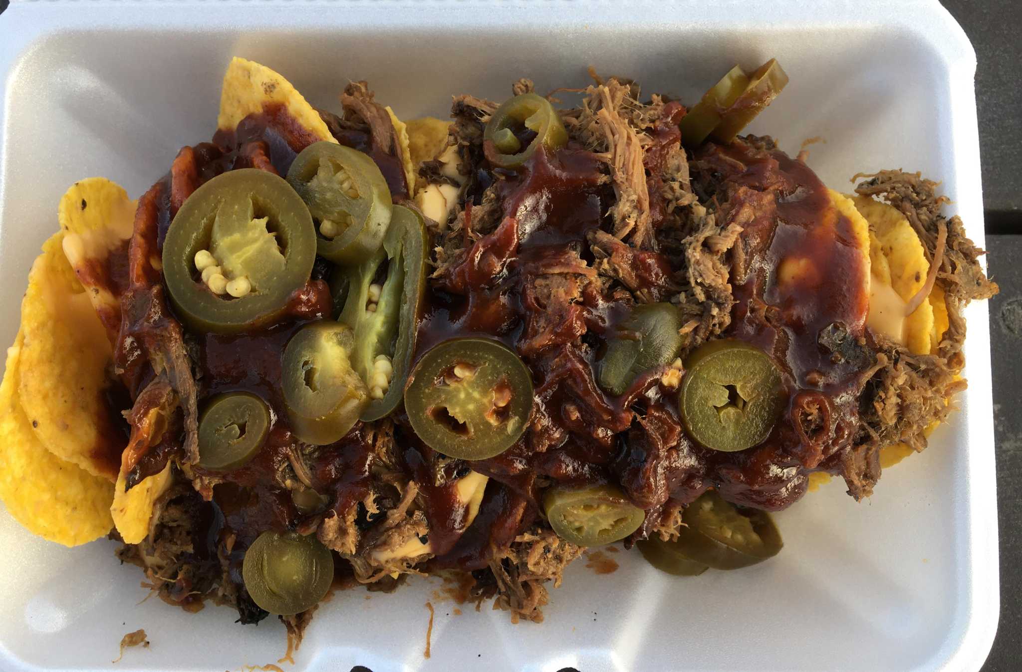 Schertz's Purple Pig BBQ excels at Midwest barbecue's rib tips and is heavy on the sauce
