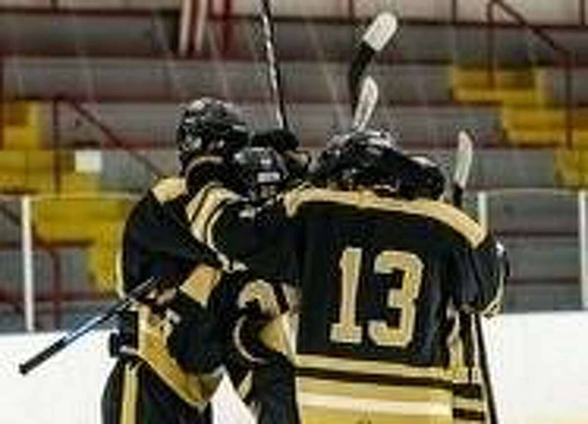 Trumbull celebrates during its victory over Staples.