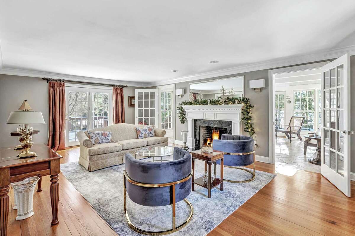 Formal living room with fireplace at 361 Brookbend Road, Fairfield.