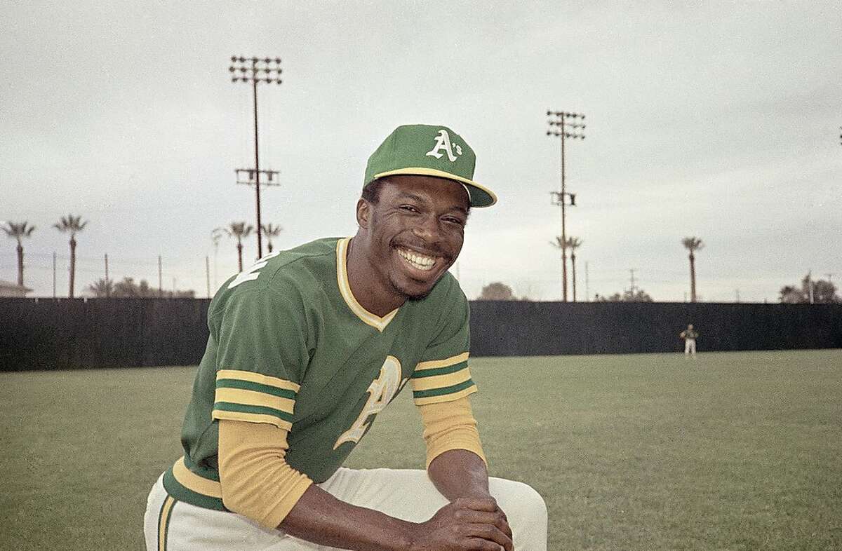 FILE - This 1975 file photo shows Herb Washington, an outfielder for the Oakland Athletics. Washington, The Black owner of 14 McDonald's franchises in Ohio has sued the corporation in federal court asserting numerous instances of unfair treatment compared with white owners. Washington in his lawsuit filed Tuesday, Feb. 16, 2021 says the Chicago-based company has steered him over the years into buying franchises in low-income, majority Black communities while denying him the chance to buy stores in more affluent white locations. (AP Photo/Robert Houston, File)
