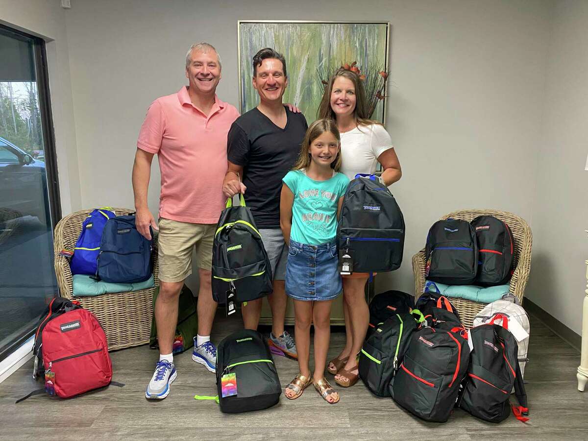 Giving out Comfort Cases at Anchorage Children's Home in Panama City, Fla., with Joel Booth and Brooke Bullard.