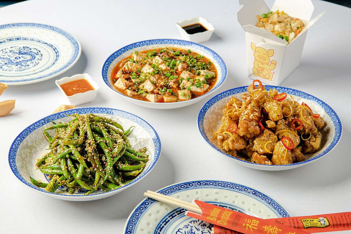 Clockwise from left: Green beans, mapo tofu and orange chicken from Lazy Susan, a Chinese-American restaurant in San Francisco.