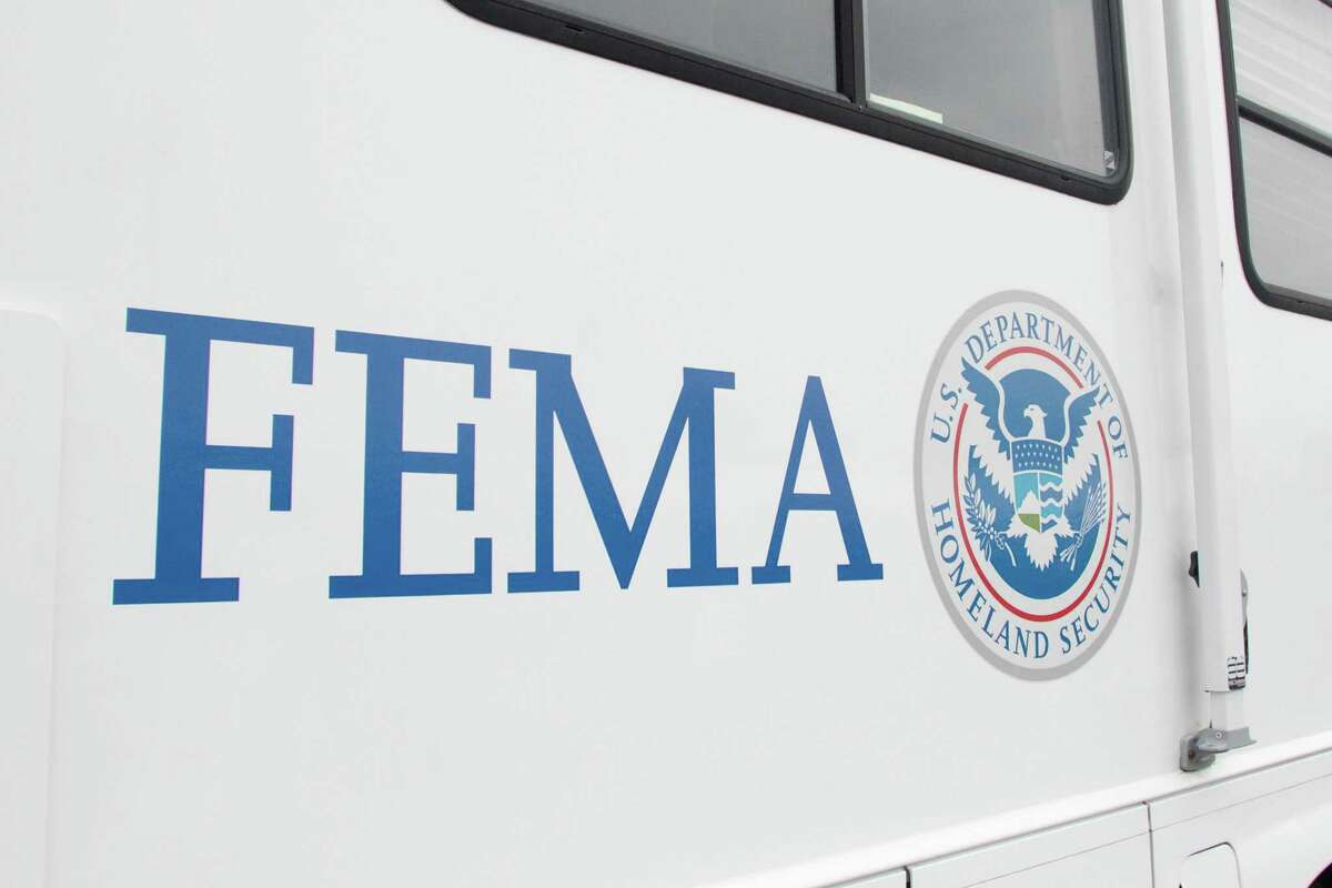 A FEMA (Federal Emergency Management Authority) trailer sits at the COVID-19 mass vaccination site opened to the public at the Oakland-Alameda Coliseum Complex in Oakland, Calif. on Feb. 16, 2021. The federal government is sending generators, water and blankets to Texas and is preparing to ship in diesel, as well, to help with backup power, the White House announced on Feb. 17, 2021