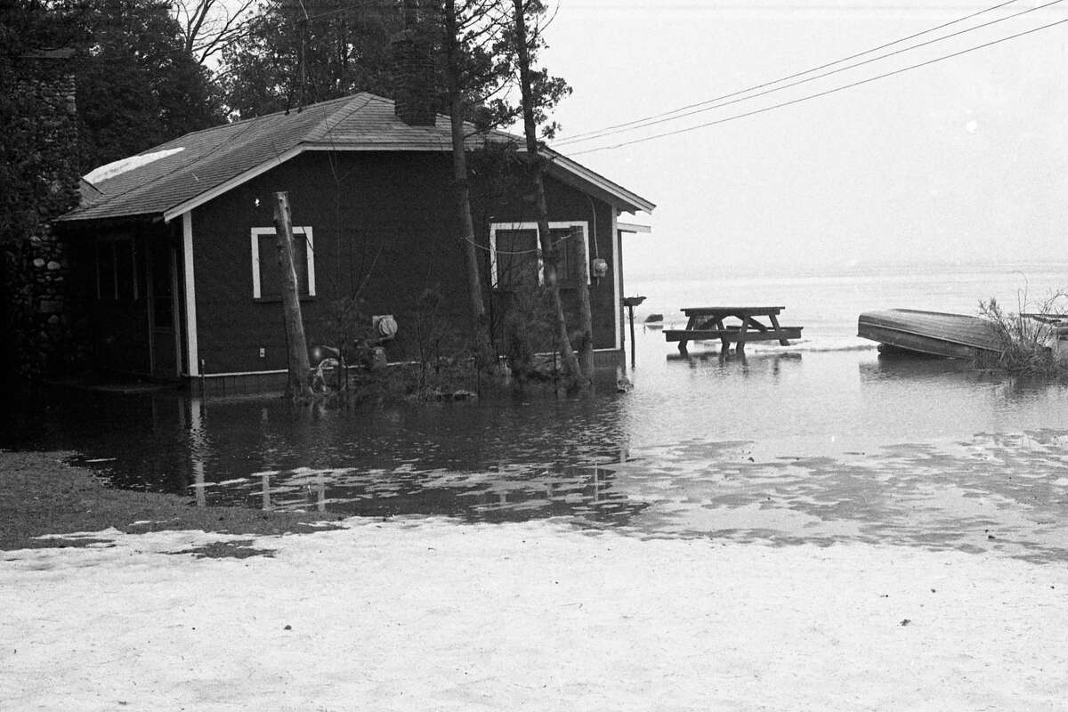 The spring-like thaw of this past week caused flooding in the Bar Lake area. The photo was published on the front page of the News Advocate on this day in 1981.  (Manistee County Historical Museum photo)