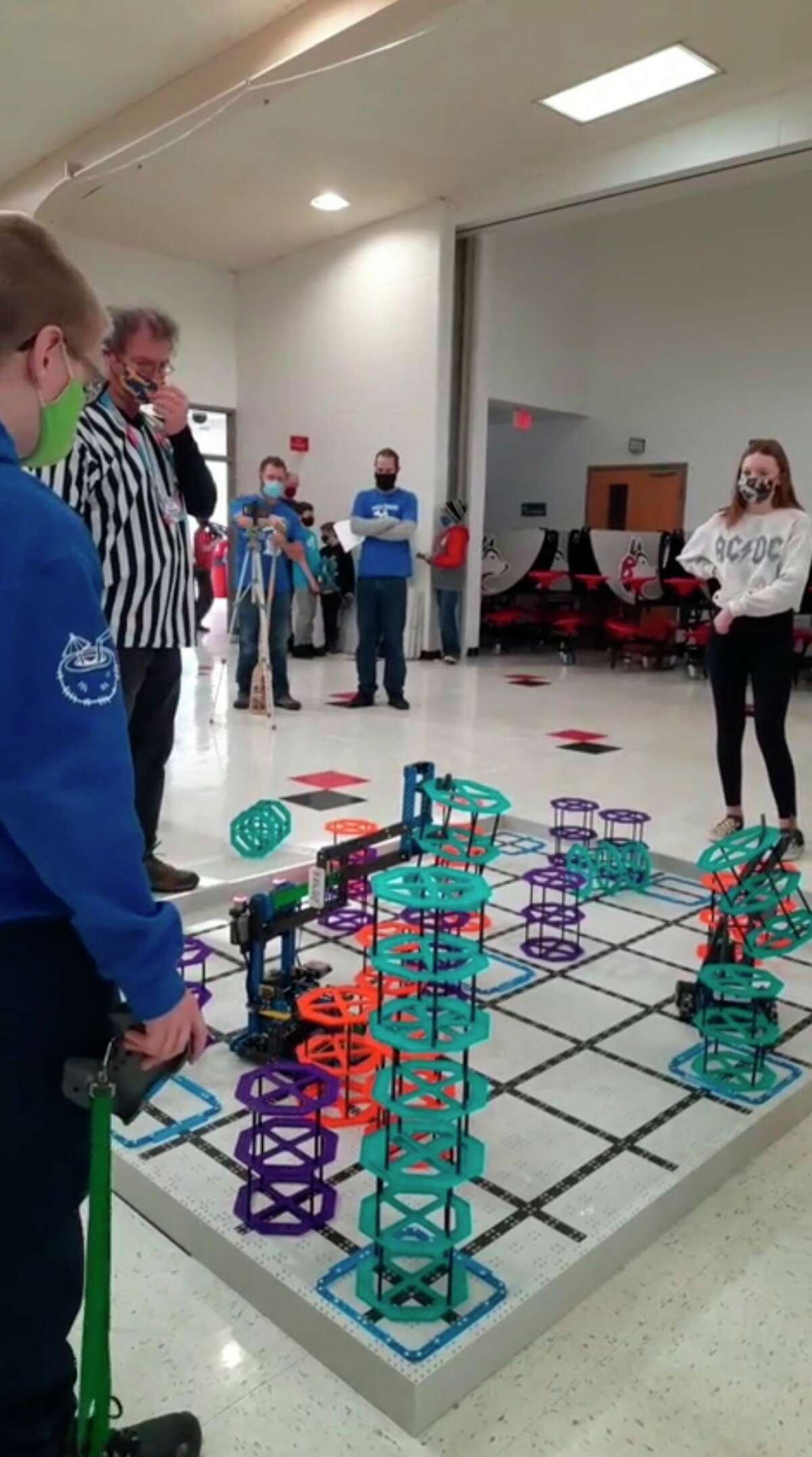 Competitors in the VEX IQ event at Benzie Central used their robots to push risers into goals and stack more risers on top of them for extra points. (Courtesy Photo)