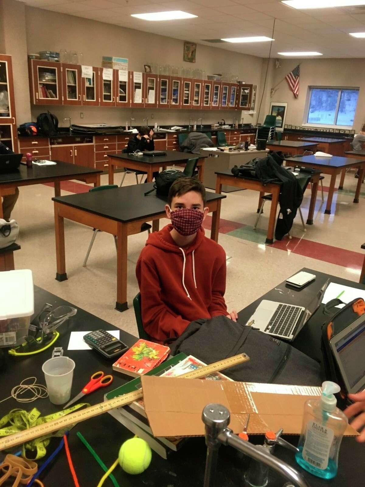 Manistee's Dylan Madsen poses for a photo Saturday during the West Ottawa Science Olympiad tournament. Manistee High School had two teams competing remotely. (Courtesy photo)