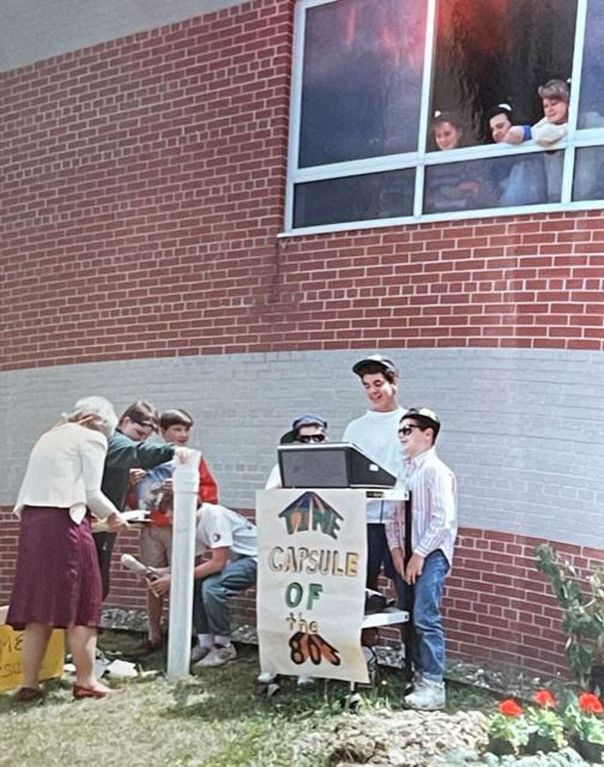 East Ridge Middle School students bury a time capsule on June 6, 1990.