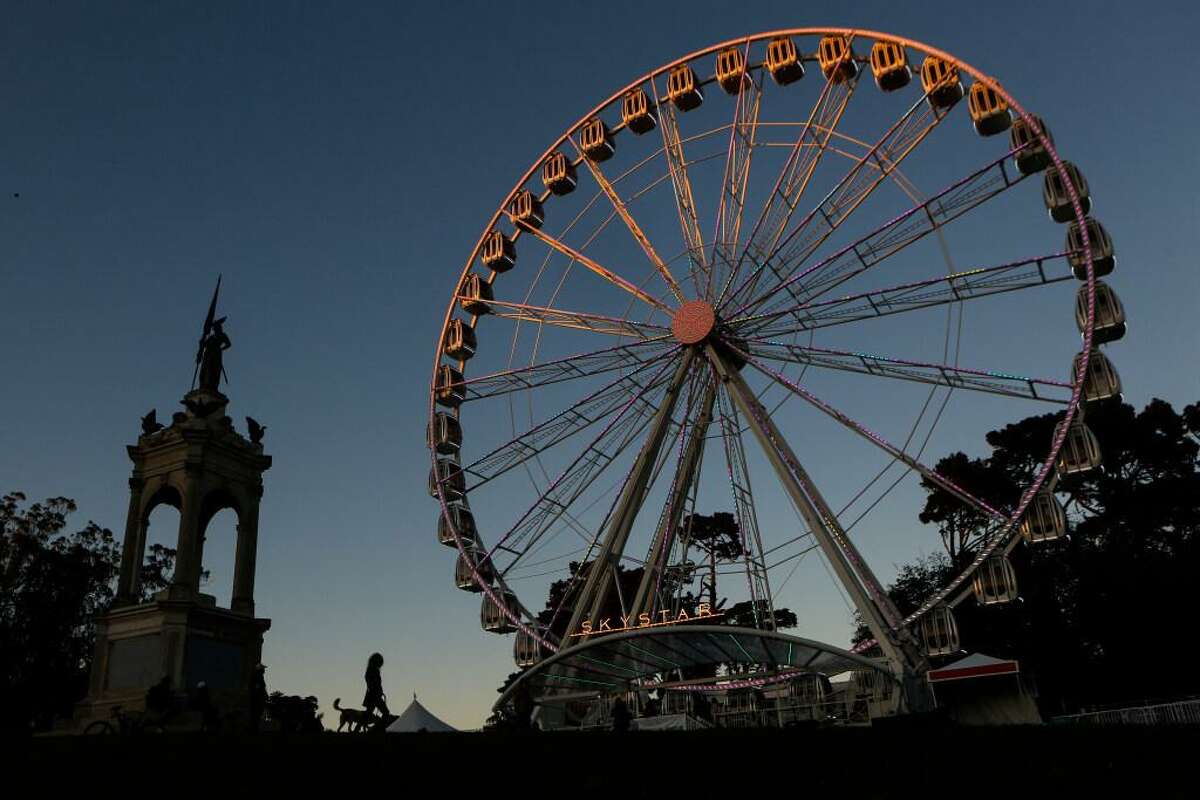 After being delayed by the pandemic the SkyStar Ferris wheel, meant to commemorate Golden Gate Park’s 150th anniversary, is seen with its lights on for the first time on Tuesday, October 20, 2020 in San Francisco, Calif. The Ferris wheel will start turning for rides on Wednesday.