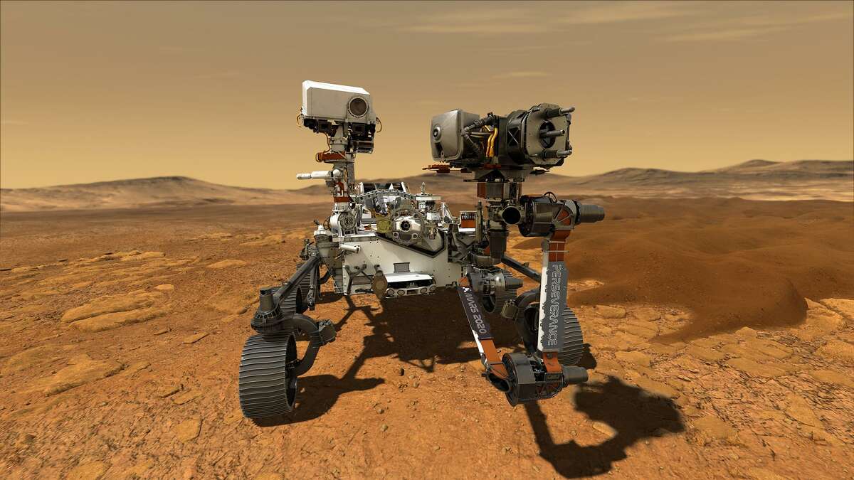 This illustration depicts NASA's Perseverance rover operating on the surface of Mars. Perseverance will land at the red planet's Jezero Crater a little after 12:40 p.m. PST on Feb. 18, 2021.