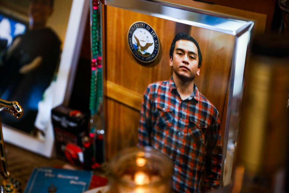 A photo of Angelo Quinto is displayed on an altar at his family’s home in Antioch. Quinto died while in Antioch police custody in December.
