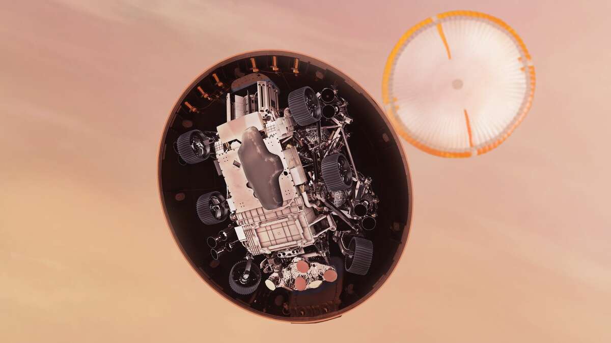 In this illustration, NASA's Perseverance rover gets its first look at the Martian surface below, after dropping its heat shield just under six minutes after entry into the Mars atmosphere. Hundreds of critical events must execute perfectly and exactly on time for the rover to land safely on Feb. 18, 2021.