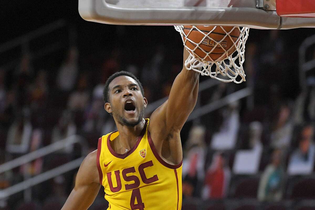 USC’s Evan Mobley dunks for two of his 22 points in a win against Arizona State. He also had nine rebounds and seven assists.