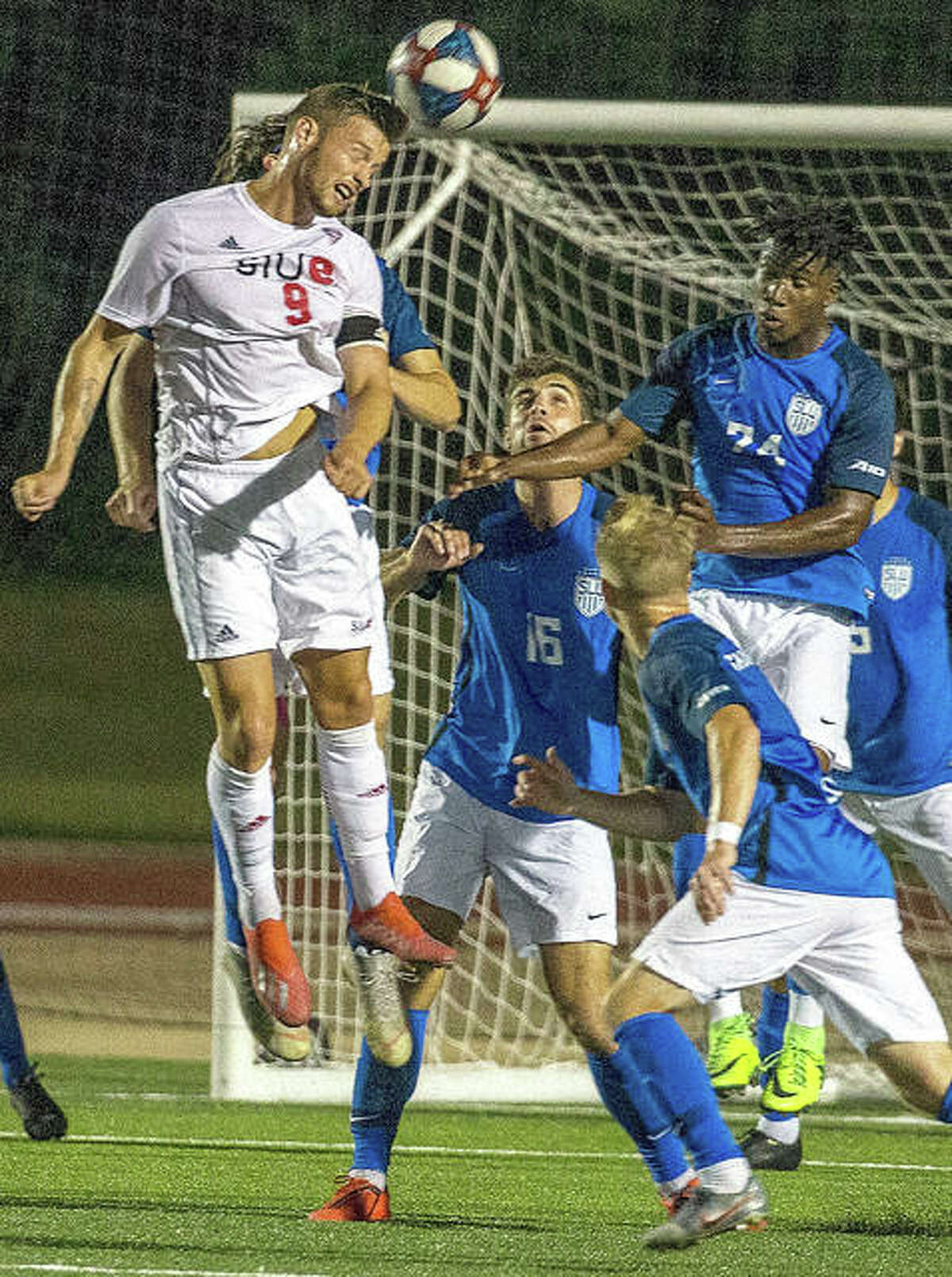 Former SIUE player Lachlan McLean (9) heads the ball during last season’s Bronze Boot game against Saint Louis University in at Korte Stadium. Saint Louis U. won in double overtime, 2-1. This year’s Bronze Boot game scheduled for Wednesday, was postponed because of weather.