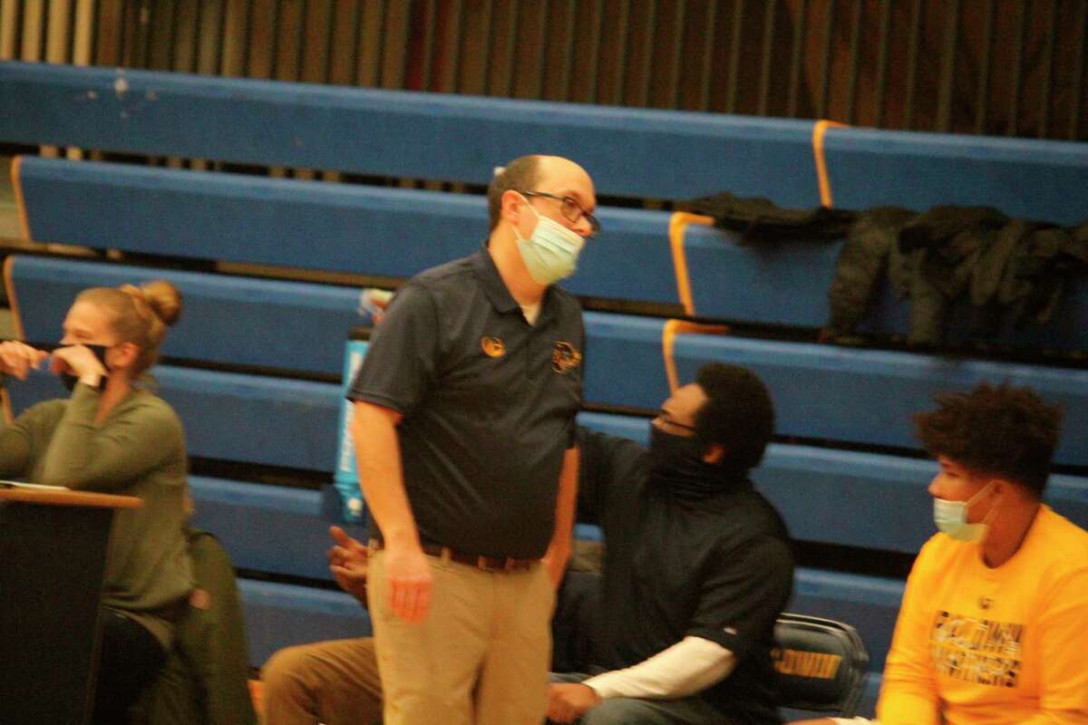 Baldwin coach JJ Eads walks along the bench area during Friday's game with Crossroads. (Star photo/John Raffel)