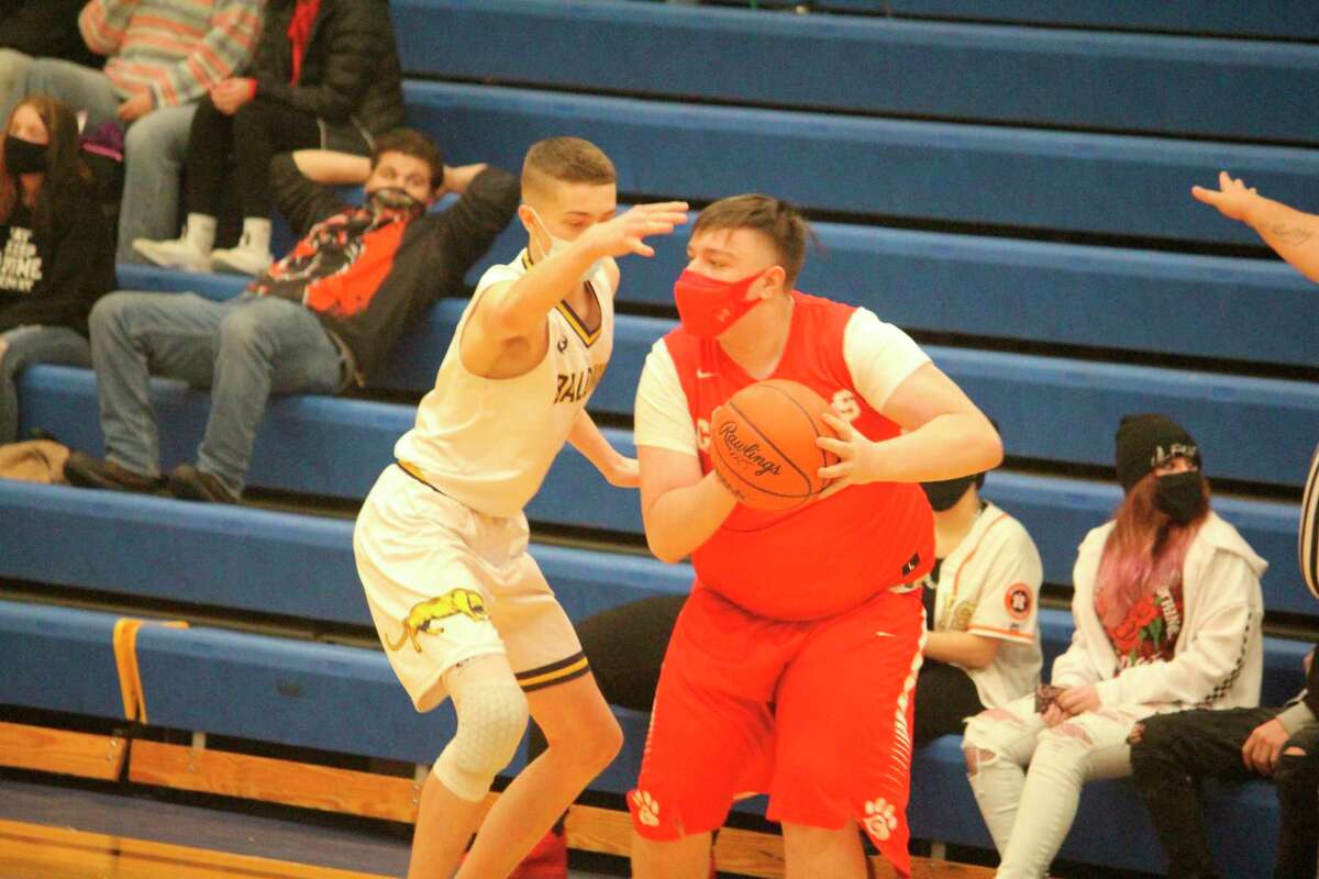 Baldwin's Dylan Hibma (left) provides the defensive power against MCC. (Star photo/John Raffel