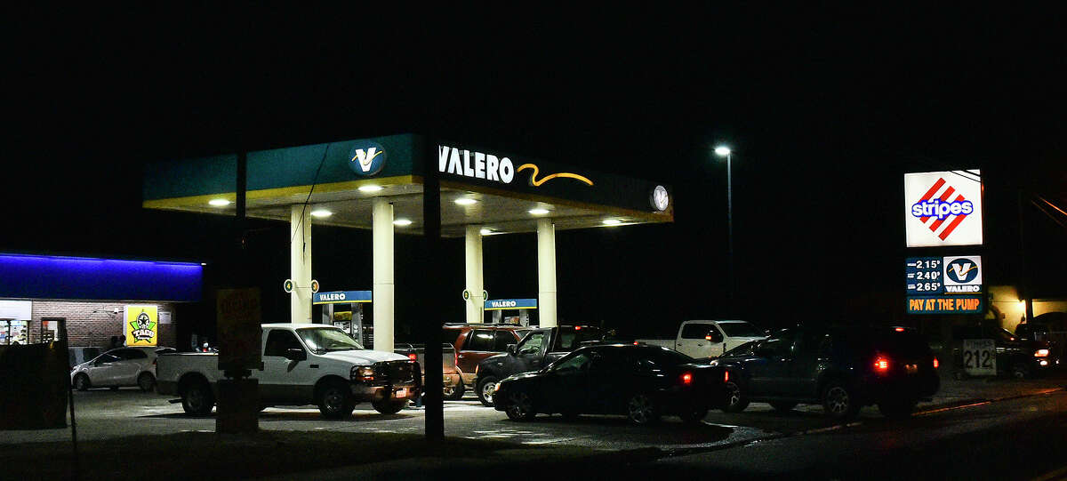 Motorists crowd a Stripes gas station on Arkansas Avenue amid a black out affecting other gas stations, Monday, Feb. 15, 2021, as Laredo experiences freezing temperatures following a winter storm.