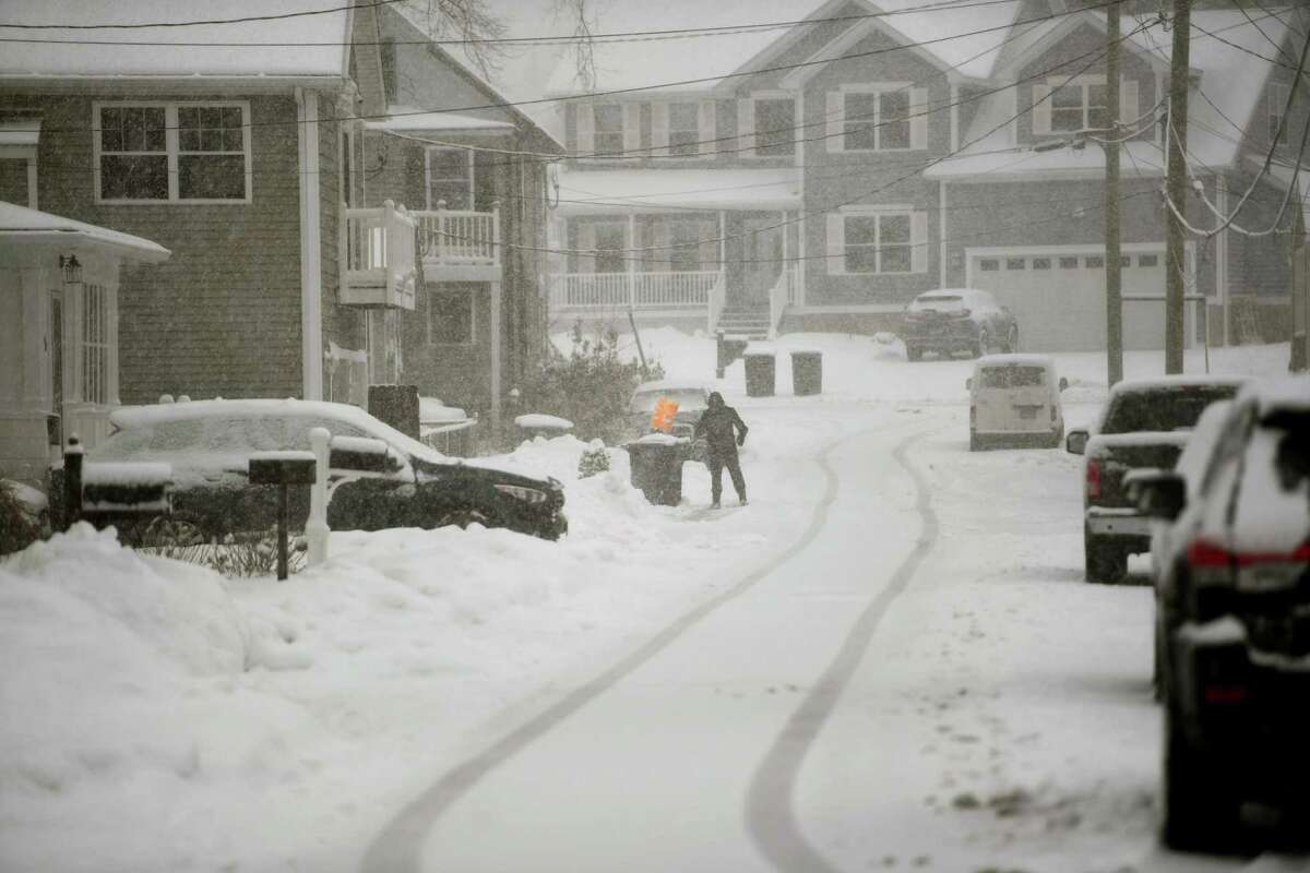 Snow accumulates during the height of the storm on Park Avenue in Miford, Conn. on Sunday, February 7, 2021.