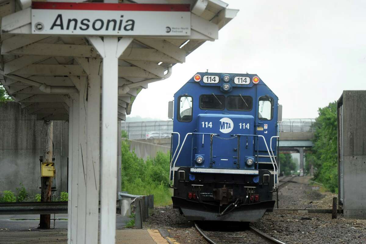 A Waterbury line Metro-North train pulls through the Ansonia train station.