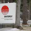 A Entergy sign is seen in front of the energy company's service center, Thursday, Feb. 18, 2021, in Conroe.