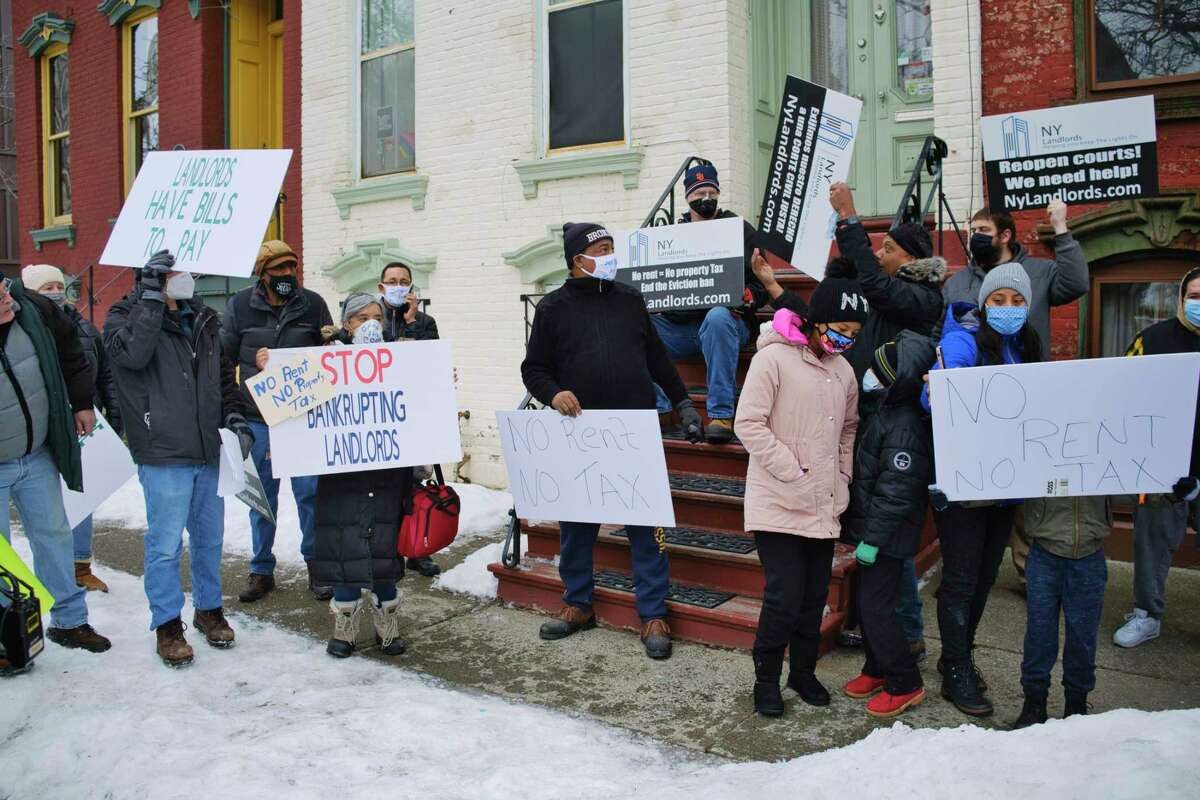 Landlords from around New York State hold a protest outside the New York State Governor's Mansion on Thursday, Feb. 18, 2021, in Albany, N.Y. Landlords say that the current eviction moratorium is severely hurting small landlords. Landlords in 2021 are protesting a law that will make it harder for them to evict tenants in the city of Albany. (Paul Buckowski/Times Union)