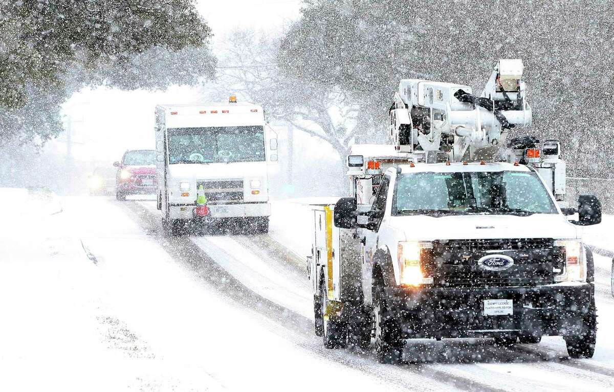 CPS Energy crews were seen driving along Vance Jackson Road during another day of snow in San Antonio on Thursday, Feb 18, 2021. “This extreme weather event has caused unimaginable hardships,” SAWS President and CEO Robert R. Puente says of the arctic blast that left hundreds of thousands without power for hours at a time while also leading to burst pipes and other water supply problems.