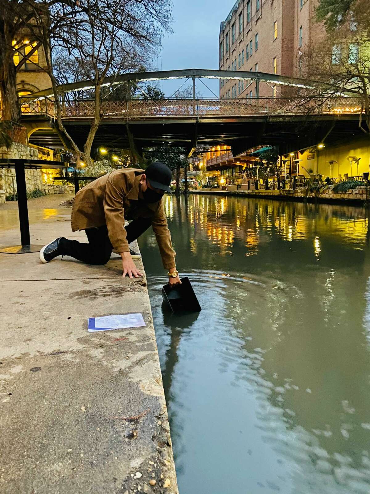 Downtown guests resorted to collecting San Antonio River water amid the utility issues plaguing Texas in the wake of winter weather.