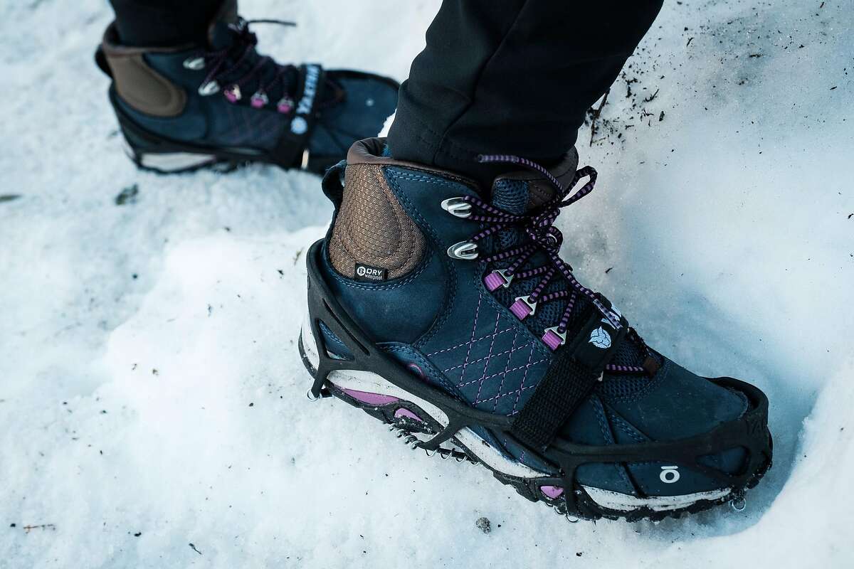 Jasmine Olvera of Reno wears traction devices on the John Muir Trail in Yosemite National Park.