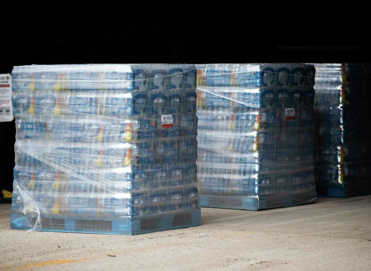 Bottled water placed on pallets at the City of Houston Upper Braes Warehouse to be delivered to vulnerable populations in the City of Houston during a boil water notice, Thursday, Feb. 18, 2021, in Houston.