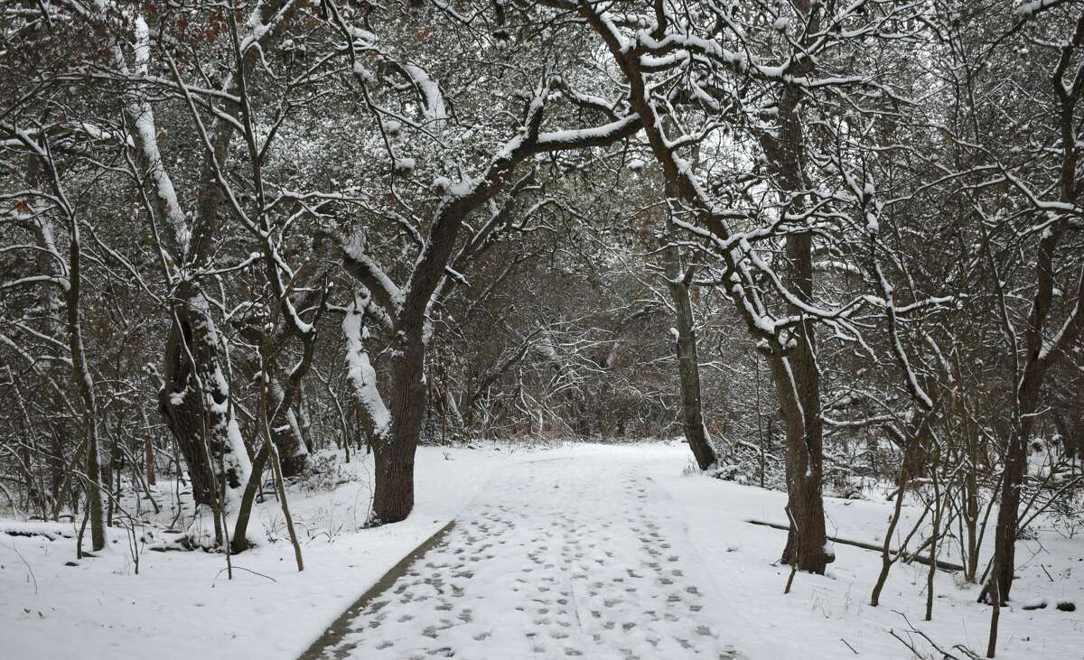 The walking trail of Salado Creek next to Salado Springs apartments was covered in snow Feb. 18, 2021.