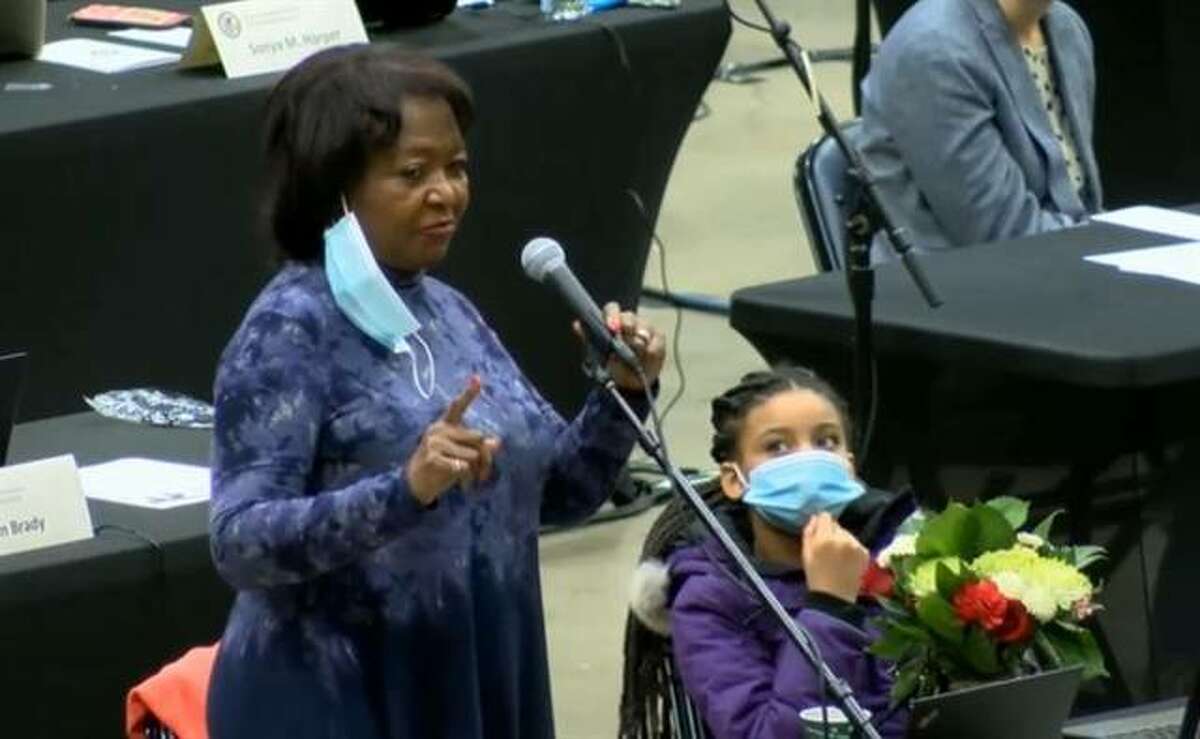 Rep. Mary Flowers, accompanied on the floor of the Bank of Springfield Center by her granddaughter at the beginning of the 102nd General Assembly in January, is the longest-serving Black lawmaker in the history of the Illinois General Assembly.