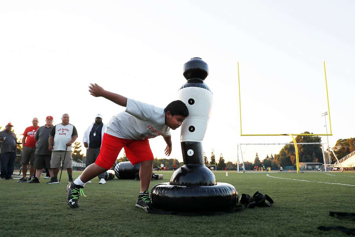 Tackling drills like this one in San Jose will return to California fields due to health guidelines updated Friday by the state.