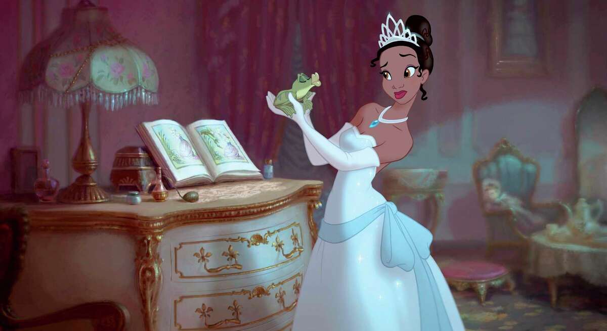 In this film publicity image released by Disney, Princess Tiana, voiced by Anika Noni Rose, holds Prince Naveen, voiced by Bruno Campos, in a scene from the animated film, "The Princess and the Frog." (AP Photo/Disney)