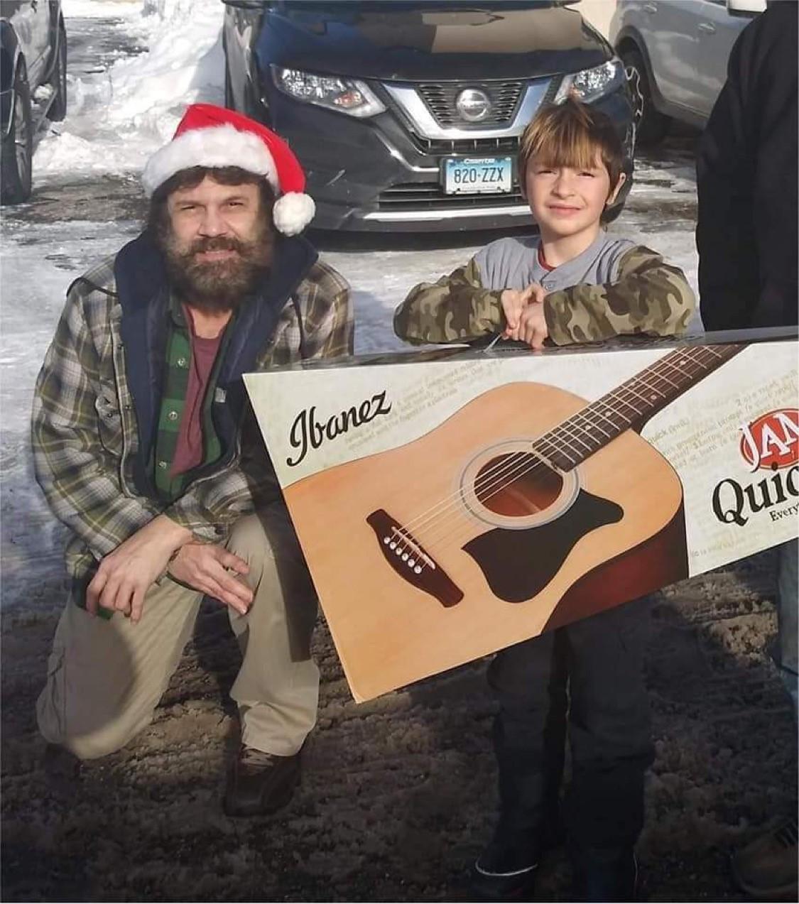 'I know they're smiling': New Milford man gives the gift of music with free guitars - Vimarsana News