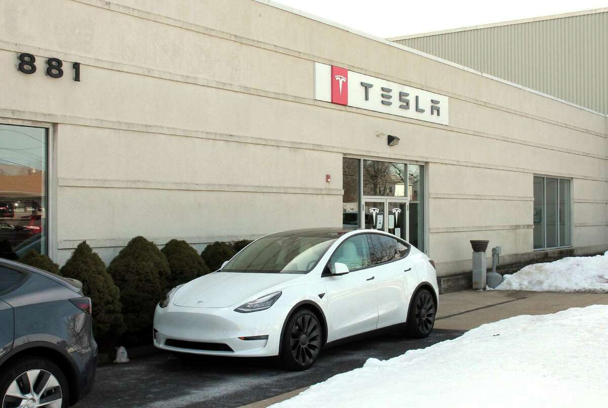 Tesla has a gallery and service center on Boston Post Road in Milford, Conn. Connecticut is looking to expand access to electric vehicles such as Tesla models by improving its EV subsidies program.